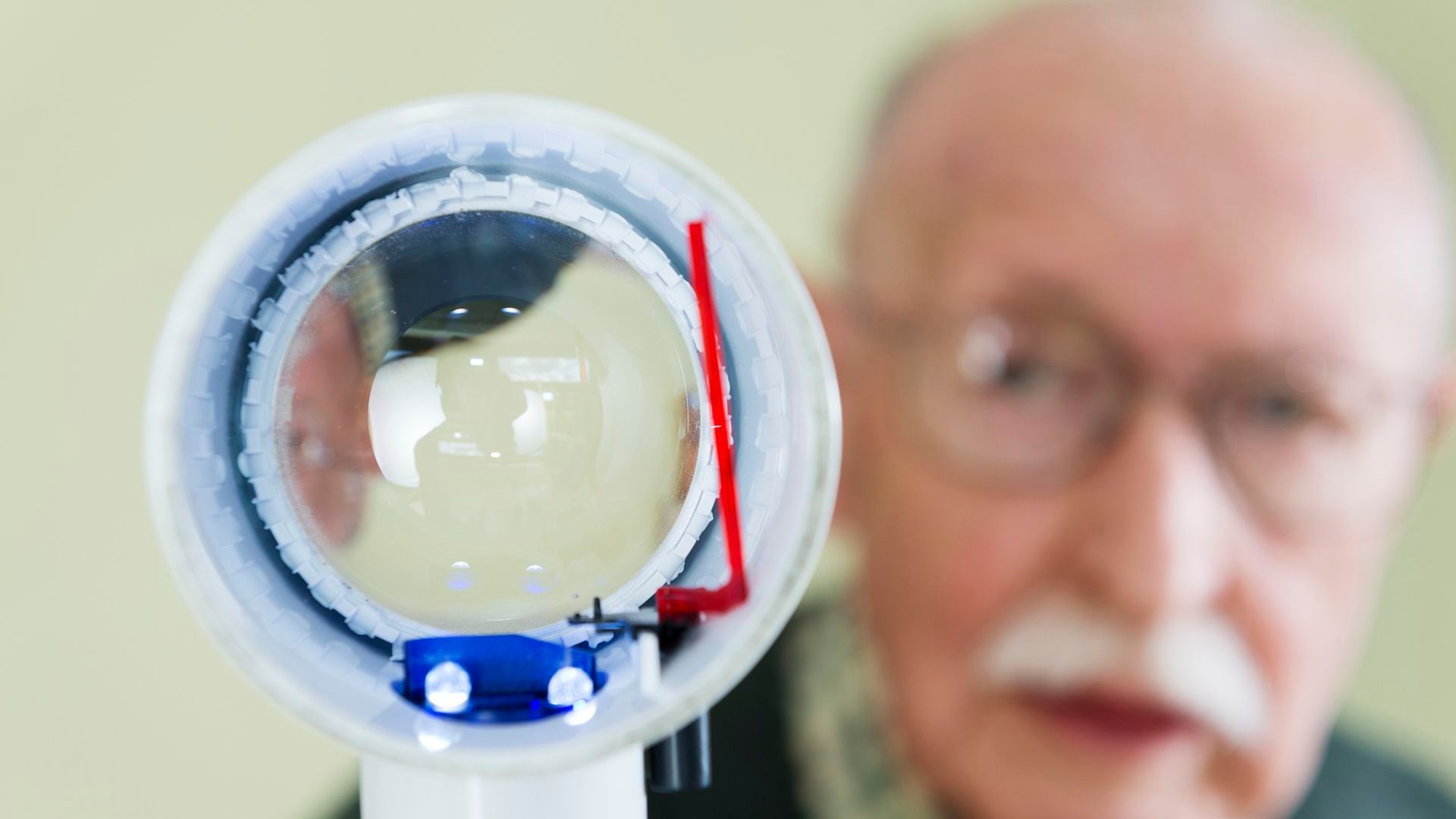 How can vision rehabilitation help a person with wet AMD?